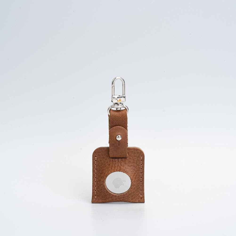 Leather AirTag bag charm with carabiner.
