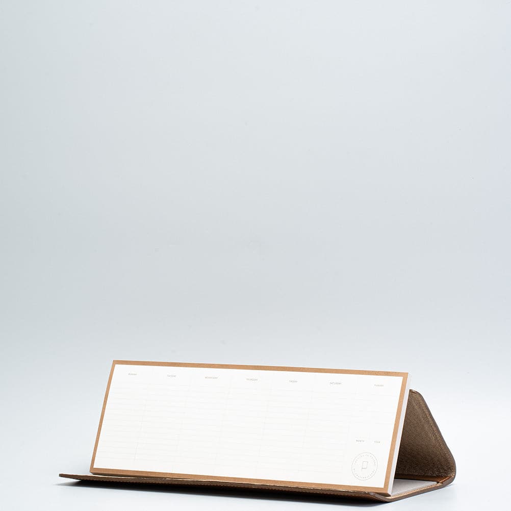 Leather desktop weekly planner.