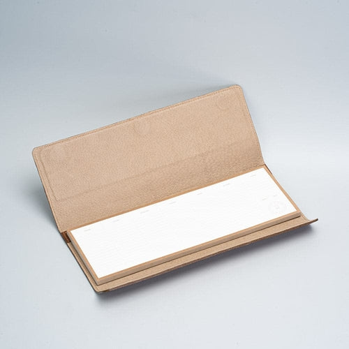 Leather desktop weekly planner.