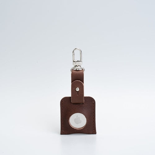 Leather AirTag bag charm with carabiner.