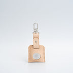 Leather AirTag bag charm with carabiner.