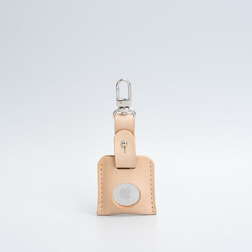 Leather AirTag bag charm with carabiner.